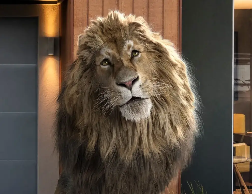 Cropped lion standing in front of a house and sectional garage door.
